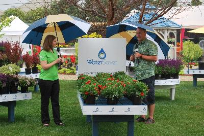Seen @ Spring Trials 2016.: PlantHaven CEO Robert Bett outlining some of the features and benefits of the WaterSaver™ Program to GIE Media Editor Karen Varga during a downpour at Spring Trials, 2016.  Might be all the water these plants need for a while....